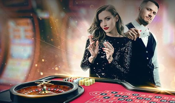 Filipino player watching a live dealer baccarat game on a mobile phone